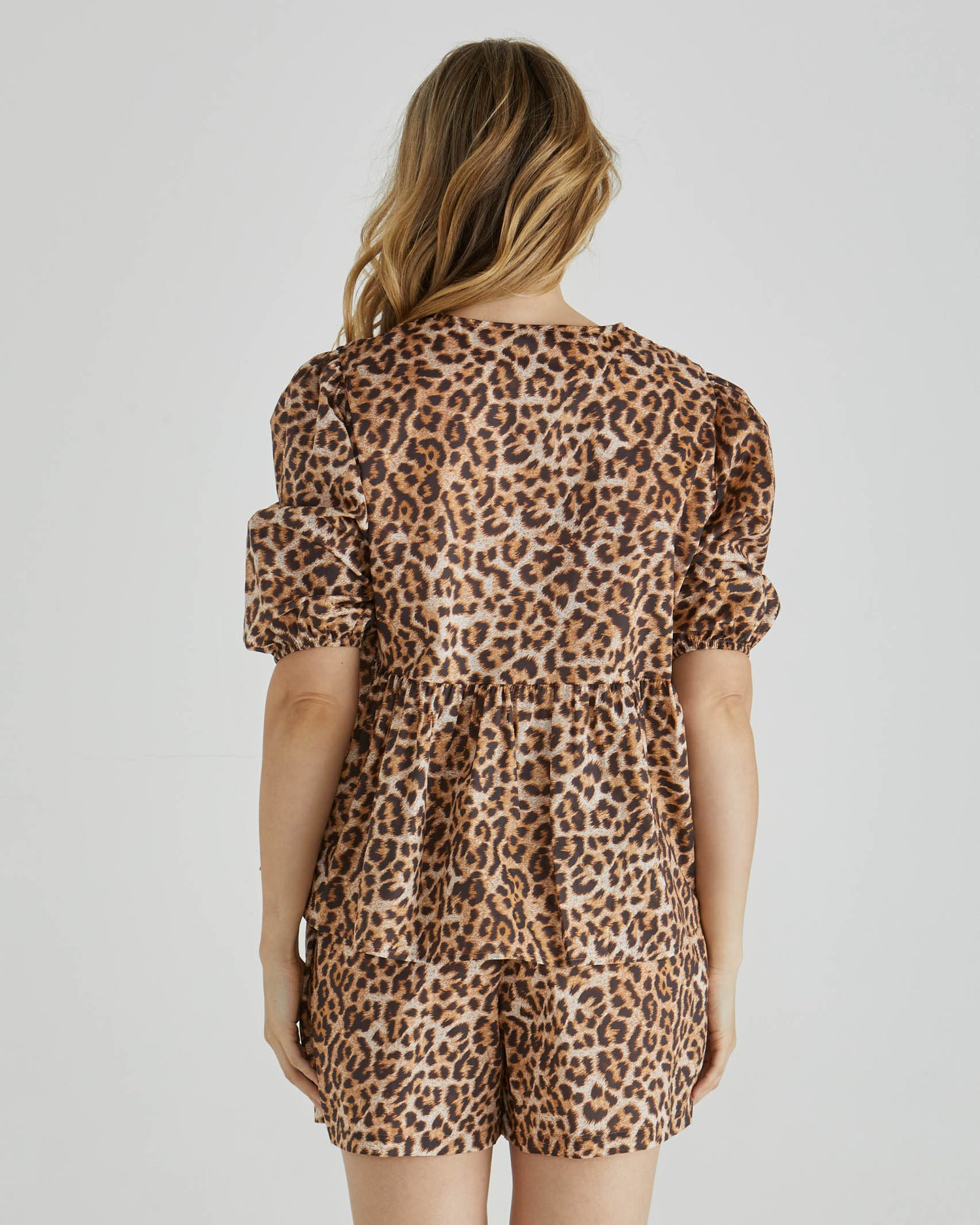 Sylvie Peplum Top - Animal Print